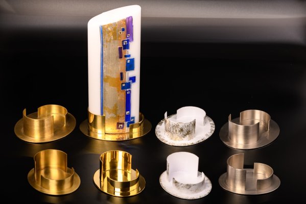 Kerzenhalter aus Messing in Gold und Silber in...